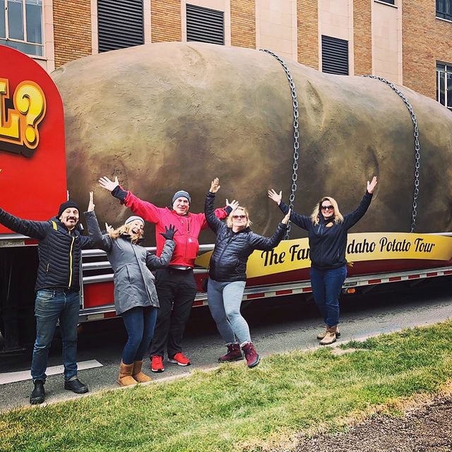 Brian of Premier Glass Tinting Boise posing in front of the Idaho Potato Tour truck